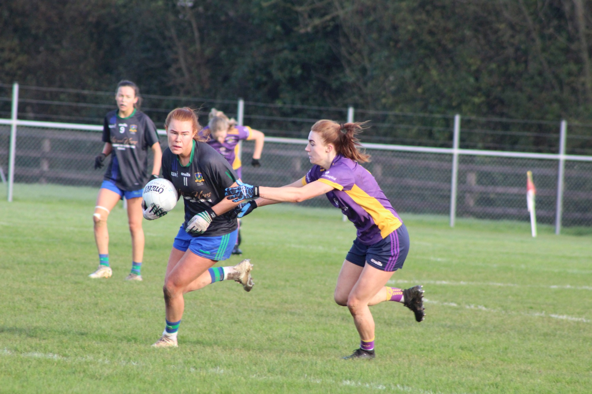 Lauren Magee (Kilmacud Crokes) tackles Kate Kenny (Naomh Ciarán) during the 2023 Leinster LGFA Senior Club Final.JPG